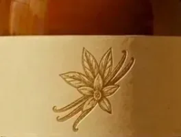 Verveine embossed vanilla orchid flower and bean motif